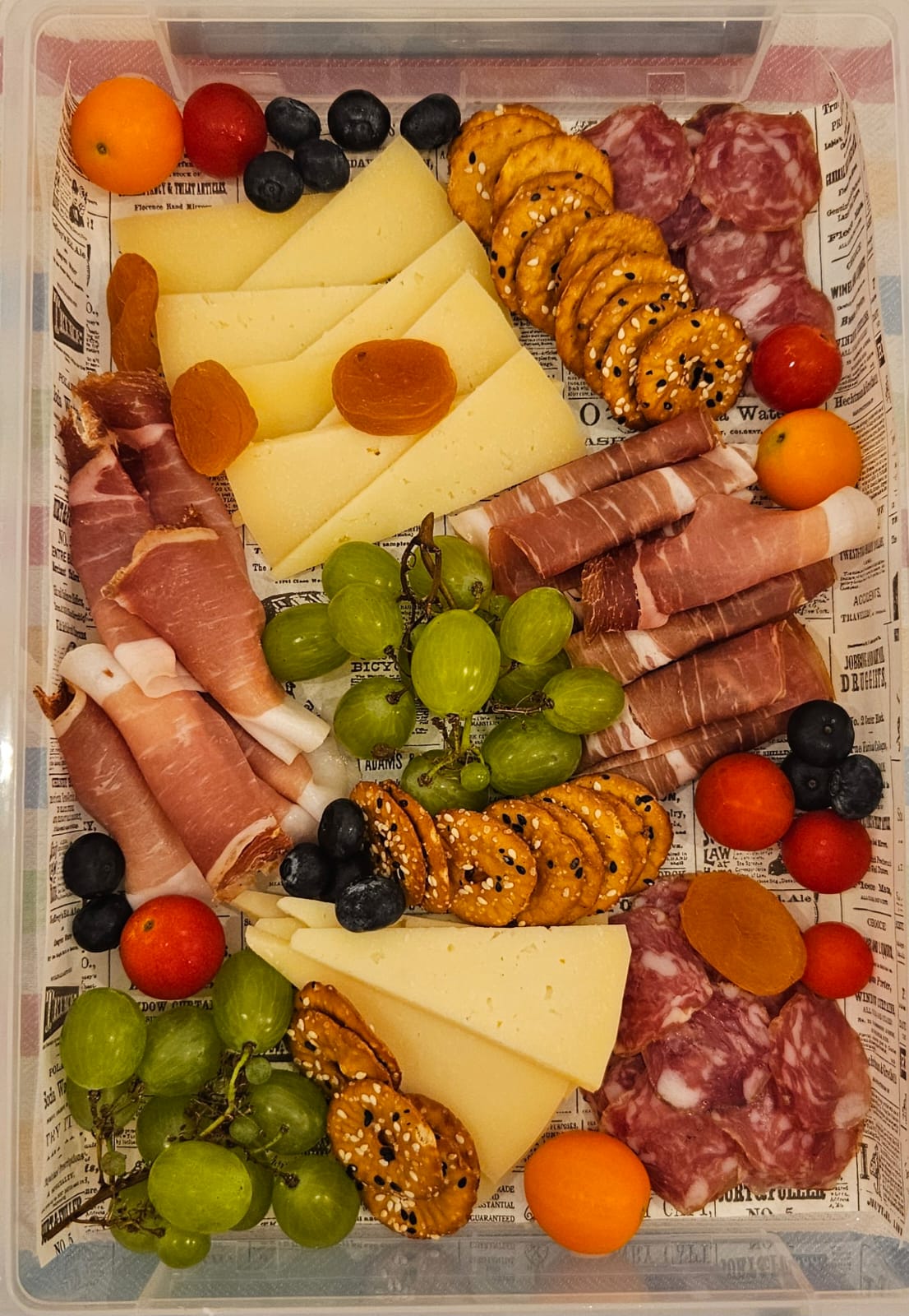 Dalmatian charcuterie & cheese board — prosciutto, cheeses, grapes and crackers